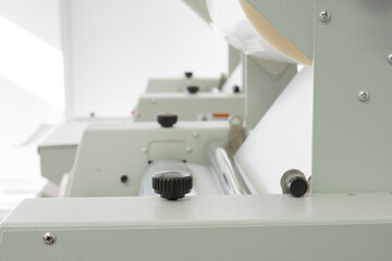 China-made Thermal cellophane machine in operation and details. 33 cm widht