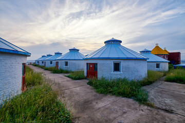 Fototapeta na wymiar The Mongolia yurts in the summer Hulunbuir grassland.