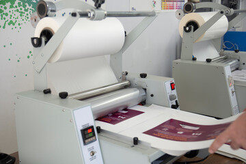 China-made Thermal cellophane machine in operation and details. 33 cm widht