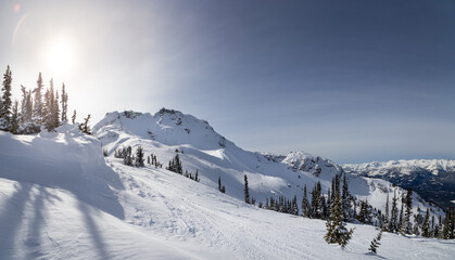 The peak of Whistler Mountain on a sunny day.