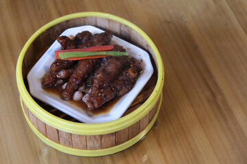 close up steamed chicken feet. Traditional Chinese snack
