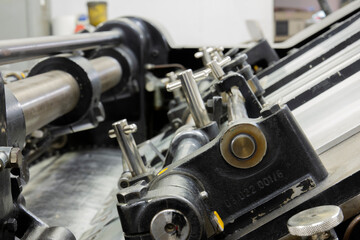 Heidelberg Cylinder printing and die cutting machine. different angle and close up to the parts.