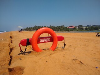 Obraz premium life buoy on the beach, safety equipment