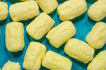 Corn sticks on blue background