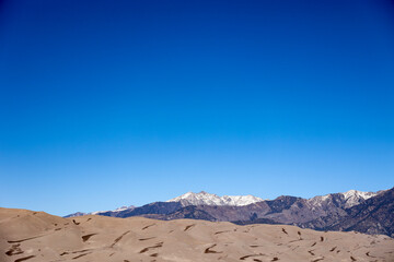 snowy mountains in the desert