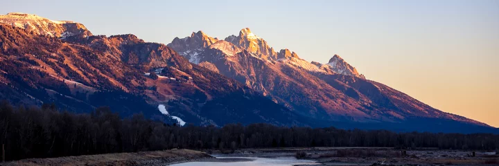 Cercles muraux Chaîne Teton sunset over the mountains with snow