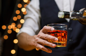 Bartender Serve Whiskey, on wood bar, 