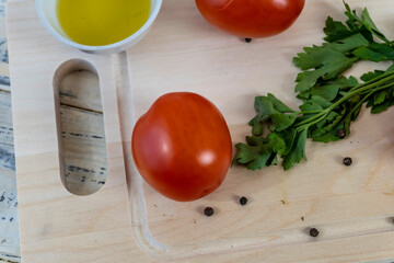 Tomatoes on the table, olive oil and balsamic vinegar, garlic, vegetables, vegetarianism, healthy eating