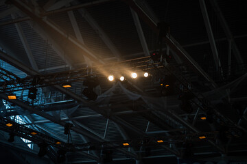 Stage lighting. Projectors in the circus.Multicolored light rays from stage spotlights on stage