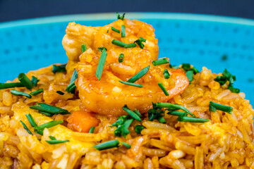 spanish paella dish with seafood, rice and chicken Top view