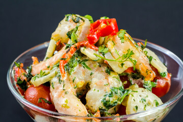 roasted shrimps with parsley and garlic, chili, tomato with lemon and salad