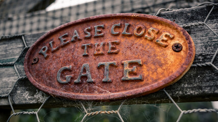 Closeup photo of a rusty sign