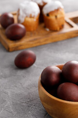 Still life many colorful easter eggs on a textural background. Rustic. Easter celebration concept.