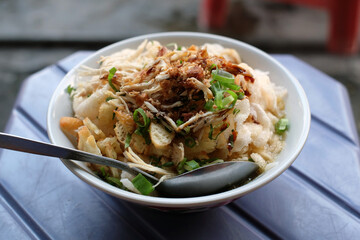 a bowl of chicken porridge