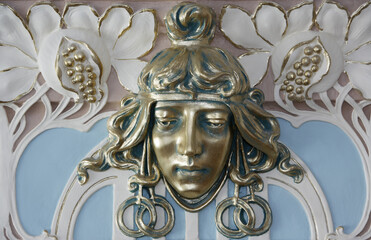 sculptural bas-relief on the wall in art nouveau style
