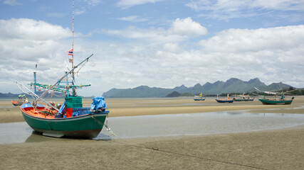 Fototapeta premium fishing boats on the beach in Hua Hin Thailand
