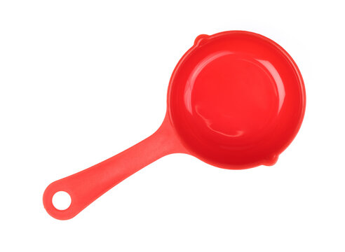 Red plastic scoop isolated on white background