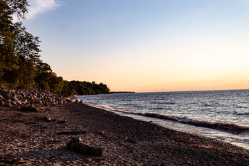 Sunset on the dim beach