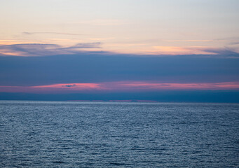 A lake with a warm sunset