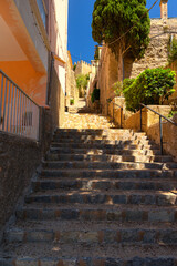 Fototapeta na wymiar Steps up to Capdepera castle on Mallorca island in Spain on a sunny day