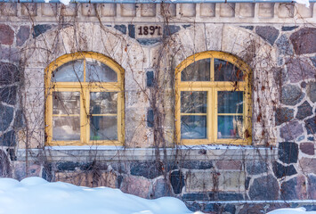 Windows in Ancient Ruins Covered with Snow in Winter in Latvia