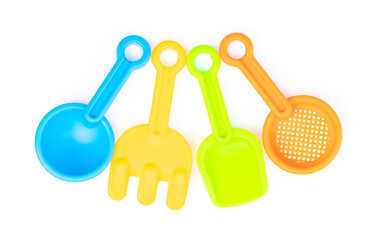 collection of toy gardening tools isolated on white background.