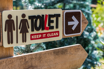 Toilet sign post of outdoor toilet.