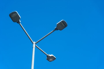 Street lighting. Street lamps photographed during the day.