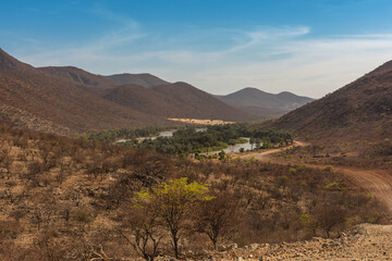 Landscape view of the Kunene River, the border river between Namibia and Angola