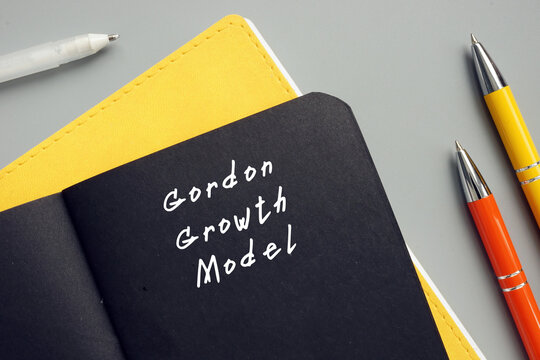 Conceptual photo about Gordon Growth Model with handwritten text.
