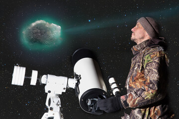 A man with a large telescope is watching flying comet.