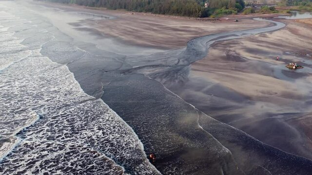 Aerial footage of Ladghar beach at Dapoli, located 200 kms from Pune on the West Coast of Maharashtra India.