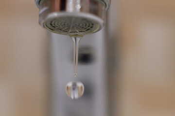 falling drop of tap water