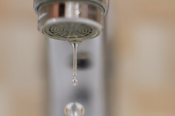 falling drop of tap water