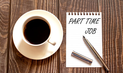 PART TIME JOB - white paper with pen and coffee on wooden background