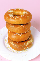 Soft steamed, fried rolls stacked vertically
