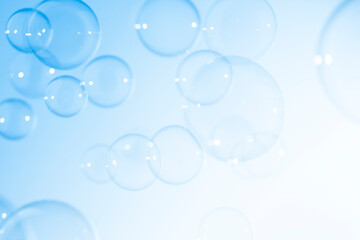 Natural Freshness Transparent Blue Soap Bubbles Floating Background.