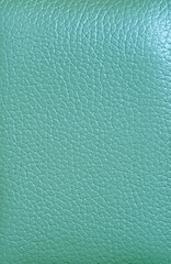 Fototapeta na wymiar Vertical image of turquoise blue colored cow leather texture for abstract background
