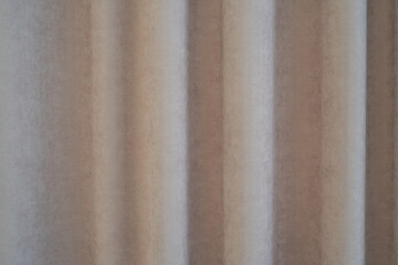 Fabric texture. Waves on a beige pink fabric