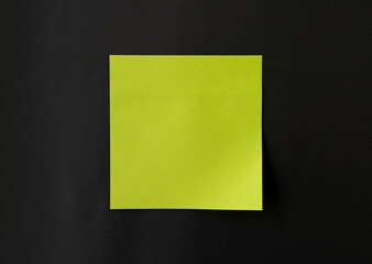 Reminder concept, blank note paper on black gray background.