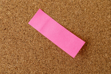 A reminder concept, blank note paper on a wooden cork board
