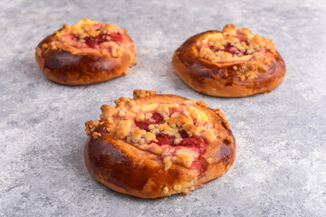 Homemade pastry buns with quark and berries