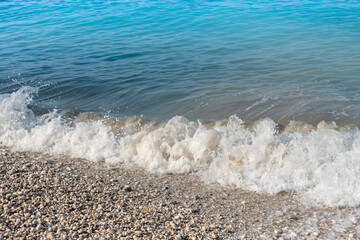 Sea waves on the pebble beach