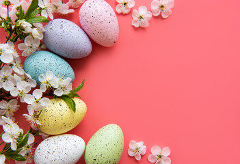 Colorful Easter eggs with spring blossom flowers