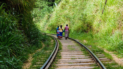 person walking on railway