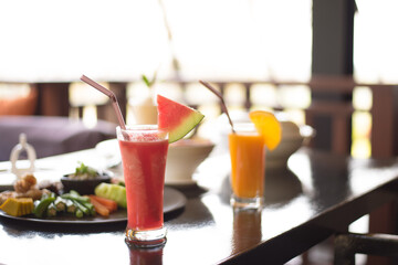 Fototapeta premium Watermelon smoothie on the table with food, selective focus