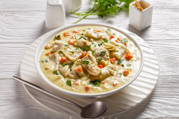 poached cod fish in milk base sauce