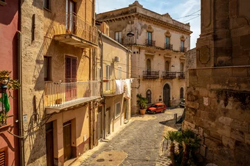 Schilderijen op glas Streets of the town of Siculiana in Sicily. A bit of a dilapidated city but with its own charm. © PawelUchorczak