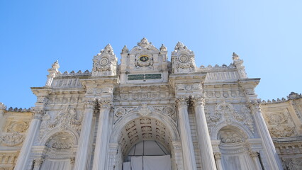 Fototapeta na wymiar Turkey istanbul 04.03.2021. Entrance and magnificent gate of Dolmabahce palace established during ottoman empire time by barque architecture great details.