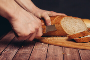 slicing loaf on a cutting board wooden table kitchen food flour product